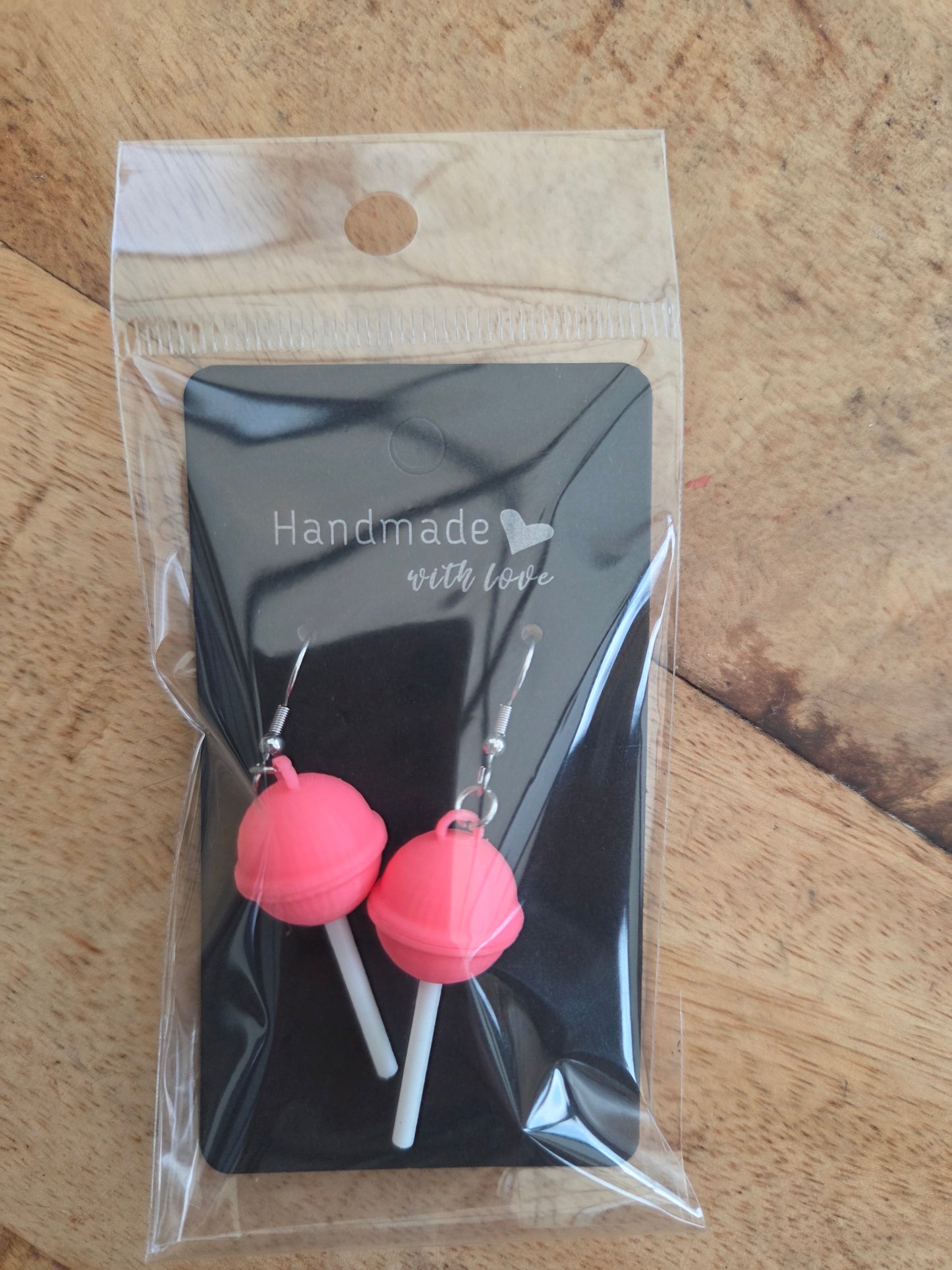 Roze lolly oorbellen